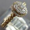 ESTATE .26CT DIAMOND 14KT YELLOW GOLD ROUND CLUSTER INVISIBLE OVAL HALO FUN RING