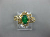 .68CT DIAMOND & AAA EMERALD 14KT YELLOW GOLD OVAL & ROUND FLOWER SWIRL FUN RING