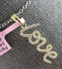 ESTATE .16CT DIAMOND 14KT YELLOW GOLD 3D CLASSIC SCRIPT LOVE FLOATING PENDANT