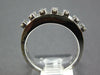 ESTATE 1.0CT DIAMOND 18KT WHITE GOLD ROUND & BAGUETTE INVISIBLE ANNIVERSARY RING
