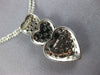 ESTATE .78CT WHITE & BLACK DIAMOND 14KT WHITE GOLD 3D HEART JOURNEY LOVE PENDANT