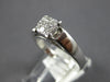 ESTATE .25CT DIAMOND 14KT WHITE GOLD PRINCESS INVISIBLE SQUARE ENGANGEMENT RING