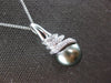 LARGE .07CT DIAMOND & AAA TAHITIAN PEARL 14KT WHITE GOLD SWIRL FLOATING PENDANT