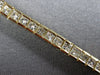ESTATE 4.54CT DIAMOND 14K YELLOW GOLD PRINCESS CHANNEL INVISIBLE TENNIS BRACELET