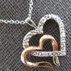 ESTATE .06CT DIAMOND 14KT WHITE & ROSE GOLD DOUBLE HEART LOVE FLOATING PENDANT
