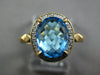 2.57CT DIAMOND & AAA BLUE TOPAZ 14KT YELLOW GOLD 3D OVAL HALO CLASSIC FUN RING