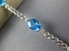 8.14CT DIAMOND & AAA BLUE TOPAZ 14KT WHITE GOLD 3D OVAL & ROUND TENNIS BRACELET