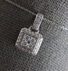 ESTATE .29CT DIAMOND 14KT WHITE GOLD ROUND CLUSTER HALO SQUARE FOATING PENDANT