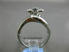 ESTATE WIDE .25CT WHITE & BLACK DIAMOND 14KT WHITE GOLD FLOWER CRISS CROSS RING