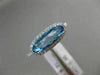 ESTATE 1.56CT DIAMOND & AAA OVAL BLUE TOPAZ 14KT WHITE GOLD HALO FILIGREE RING