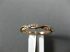 ESTATE .15CT DIAMOND 14K ROSE GOLD SWIRL INFINITY SEMI ETERNITY ANNIVERSARY RING