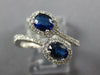 WIDE 1.23CT DIAMOND & AAA SAPPHIRE 18KT WHITE GOLD OVAL & ROUND CRISS CROSS RING