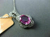 ESTATE .97CT DIAMOND & AAA PINK SAPPHIRE 14KT WHITE GOLD FLOWER FLOATING PENDANT