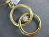 ESTATE LARGE .19CT DIAMOND 18K YELLOW GOLD FLOWER CIRCULAR LOVE KNOT FUN PENDANT