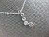 ESTATE .25CT DIAMOND 14KT WHITE GOLD MULTI FLOWER JOURNEY FUN FLOATING PENDANT