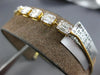 .92CT DIAMOND 18K YELLOW GOLD ROUND & BAGUETTE CLUSTER INVISIBLE TENNIS BRACELET