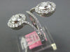 LARGE 1.06CT DIAMOND 18K WHITE GOLD ROUND & BAGUETTE INVISIBLE CRISS CROSS RING