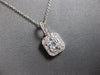 .31CT DIAMOND 18KT WHITE GOLD ROUND & BAGUETTE SQUARE INVISIBLE FLOATING PENDANT