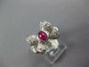 ESTATE .87CT DIAMOND & AAA RUBY PLATINUM 3D OVAL AND ROUND CLASSIC BOW RING