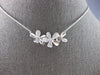 ESTATE .21CT DIAMOND 14KT WHITE GOLD 3D TRIPLE FLOWER LOVE NECKLACE #28158