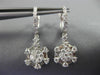 LARGE 14KT WHITE GOLD HUGGIE HANGING EARRINGS. 3D FLOWER OCTAGON DESIGN