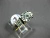 ESTATE .42CT BAGUETTE & ROUND DIAMOND & CUBIC ZIRCONIUM PLATINUM ENGAGEMENT RING