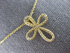 ESTATE .03CT DIAMOND 14KT YELLOW GOLD 3D CLASSIC INFINITY CROSS FLOATING PENDANT