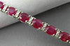 ESTATE WIDE 12.22CT DIAMOND & RUBY 18K WHITE GOLD CLASSIC OVAL TENNIS BRACELET