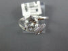 ESTATE 1.33CT DIAMOND & AAA WHITE TOPAZ 14KT WHITE GOLD LOVE KNOT SOLITAIRE RING