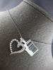 ESTATE .50CT DIAMOND 14KT WHITE GOLD 3D CLASSIC OPEN HEART LOVE FLOATING PENDANT