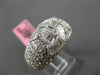 ESTATE 5.18CT ROUND & BAGUETTE DIAMOND 18K WHITE GOLD 3D INFINITY LOVE KNOT RING