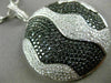 LARGE 4.51CT WHITE & BLACK DIAMOND 18KT WHITE & BLACK GOLD CIRCULAR WAVE PENDANT