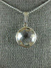 ESTATE AAA CRYSTAL 14KT WHITE GOLD 3D CLASSIC BEZEL ROUND PENDANT
