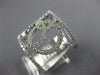 ESTATE LARGE .84CT DIAMOND 18KT WHITE GOLD CIRCLE OF LIFE INTERTWINING FUN RING