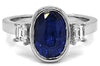 3.83CT DIAMOND & AAA SAPPHIRE 18KT WHITE GOLD 3D OVAL & EMERALD CUT 3 STONE RING