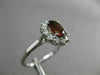ESTATE 1.45CT DIAMOND & NATURAL GARNET 18KT WHITE GOLD OVAL HALO ENGAGEMENT RING