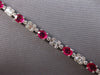6.71CT DIAMOND & AAA RUBY 14KT WHITE GOLD OVAL ROUND & BAGUETTE TENNIS BRACELET