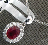 SMALL .62CT DIAMOND & AAA RUBY 18KT WHITE GOLD 3D ROUND & OVAL FLOWER PENDANT