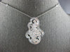 EXTRA LARGE 2.55CT DIAMOND 18KT WHITE GOLD ROUND & BAGUETTE FLORAL LOVE PENDANT