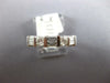 ESTATE .64CT DIAMOND 14KT WHITE GOLD ROUND & BAGUETTE CLASSIC ANNIVERSARY RING