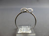 ESTATE .12CT DIAMOND 14K WHITE GOLD 3D CLASSIC LOVE KNOT INFINITY STAR LOVE RING