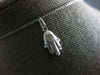 SMALL .04CT DIAMOND 14KT WHITE GOLD MATTE & SHINY HAMSA CHAMSA FLOATING PENDANT