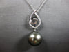 ESTATE LARGE. 15CT DIAMOND & AAA TAHITIAN PEARL 18K WHITE GOLD LOVE KNOT PENDANT