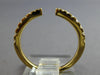 ESTATE .29CT DIAMOND 18KT YELLOW GOLD CLASSIC ROUND GRADUATING TENSION FUN RING