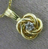 ESTATE SMALL .03CT DIAMOND 14KT YELLOW GOLD 3D FLOATING LOVE KNOT PENDANT #25417