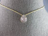 ESTATE .17CT DIAMOND 14KT YELLOW GOLD ROUND & BAGUETTE CLUSTER TEAR DROP PENDANT