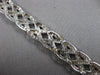 WIDE 4.20CT DIAMOND 14KT WHITE GOLD ROUND CRISS CROSS INFINITY TENNIS BRACELET