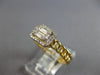 .22CT DIAMOND 14KT YELLOW GOLD ROUND & BAGUETTE INVISIBLE SQUARE LOVE KNOT RING