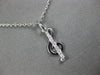 ESTATE .06CT DIAMOND 14KT WHITE GOLD CLASSIC MUSICAL NOTE FUN FLOATING PENDANT