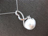 LARGE .36CT DIAMOND & SOUTH SEA PEARL 18KT WHITE GOLD LOVE KNOT FLOATING PENDANT